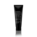 A black tube of Revision Skincare Pore Purifying Clay Mask stands upright, its back label displaying white usage instructions. Set against a white background, it highlights the masks promise to unclog pores and absorb excess oil.