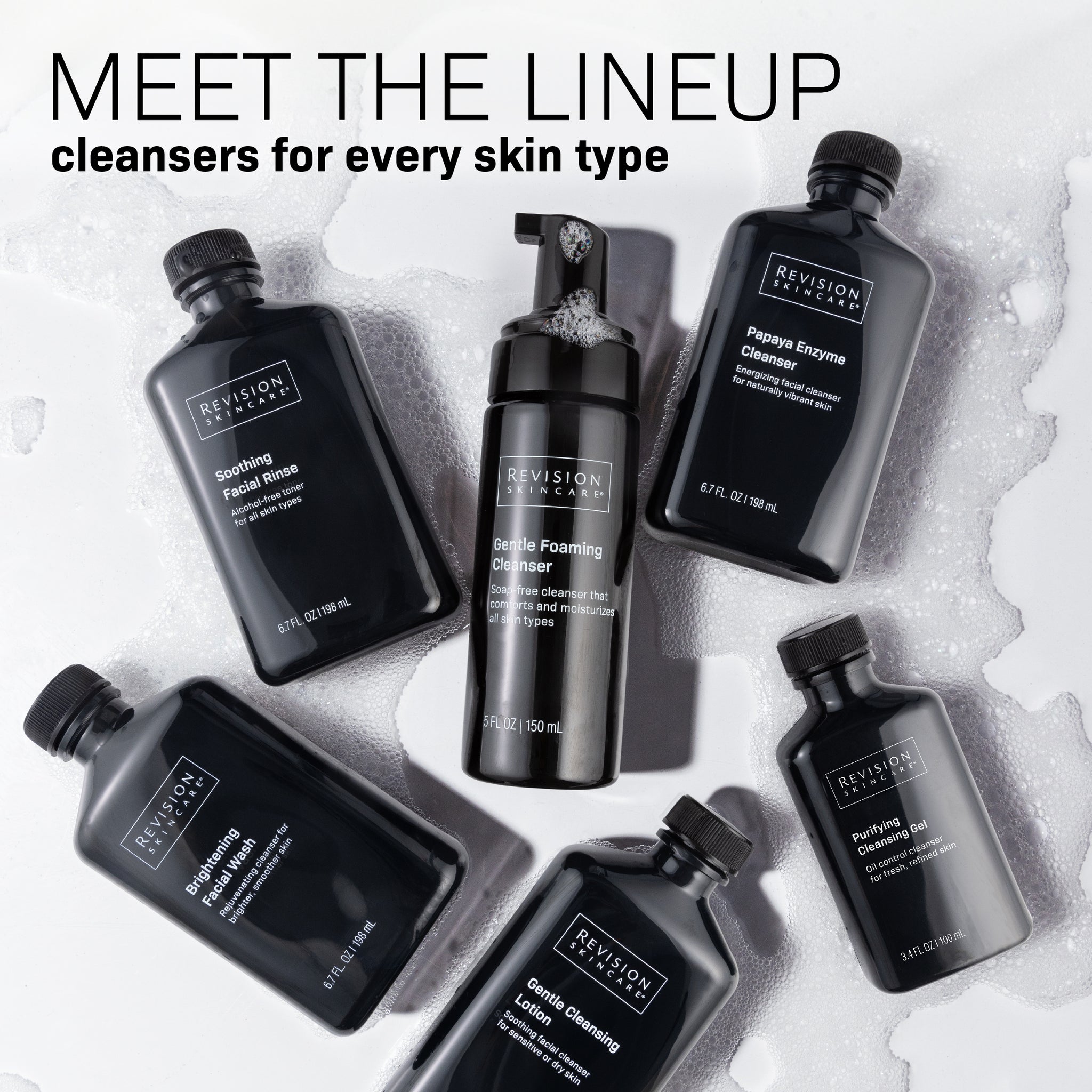Six black Revision Skincare Gentle Cleansing Lotion bottles are arranged on a white surface with water droplets. Text above reads: MEET THE LINEUP: Gentle Cleansing Lotion, with naturally-derived cleansing agents for dry or sensitive skin.
