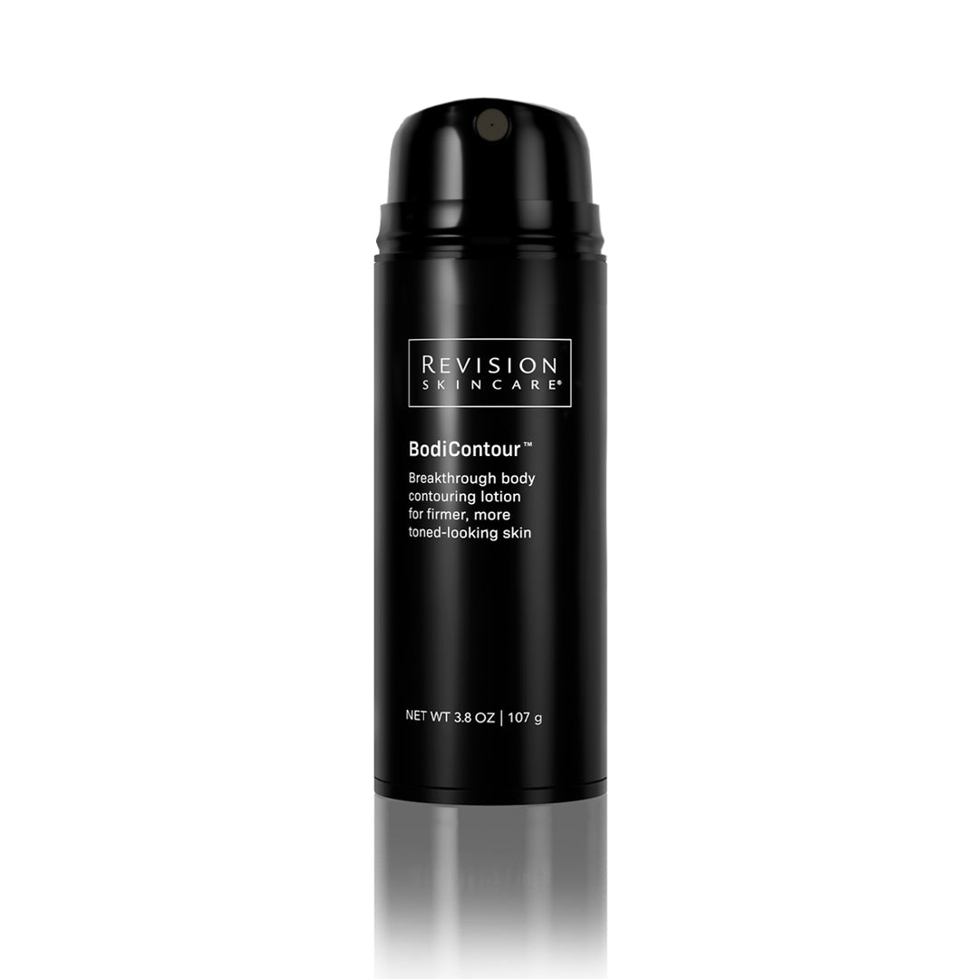 A black Revision Skincare BodiContour™ bottle with a pump top stands upright on a white background. The label features iFirm® Technology for firmer, more toned-looking skin.