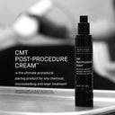 A black bottle of Revision Skincare’s CMT Post-Procedure Cream™ sits on a surface, background blurred. Text highlights its neurocosmetic technology to reduce downtime after chemical, microneedling, or laser treatments.