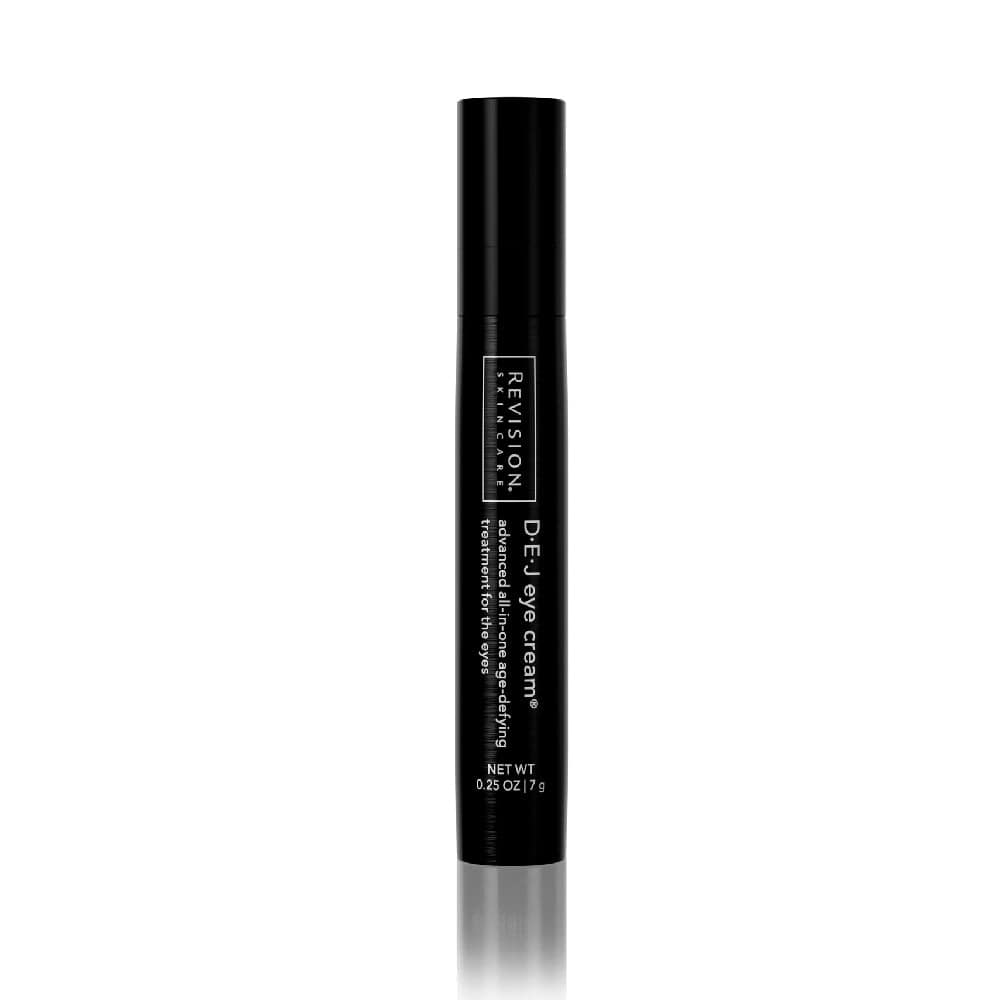 A black cylindrical tube of D·E·J Eye Cream® by Revision Skincare with white text stands upright on a white background. The label shows product info, net wt 0.25 oz (7 g), and it addresses eyelid drooping and other signs of aging.