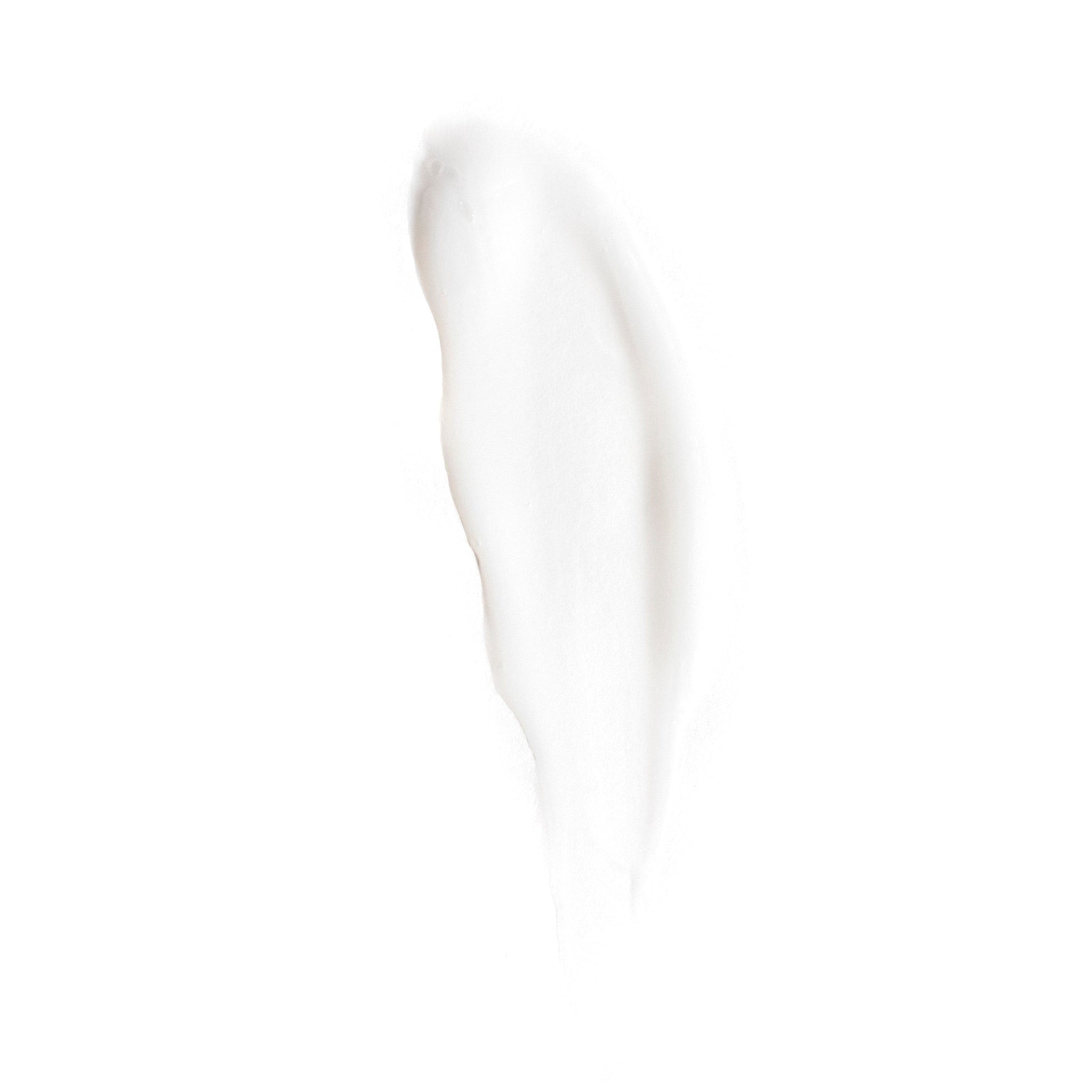 A smooth, white, creamy substance is swatched on a plain background, suggesting Revision Skincare’s Gentle Cleansing Lotion, specially formulated for dry or sensitive skin.