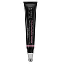 A black tube of Revision Skincare’s Tinted YouthFull Lip Replenisher® features a metal applicator, white and pink text, clear cap, and hydrates while providing a tint to lips.