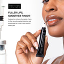 A woman applies Revision Skincare’s Injection Perfection Full-Size Regimen, designed to target expression lines for fuller, smoother lips. A close-up of her lower face and hand holding the tube suggests an injection-like treatment effect.