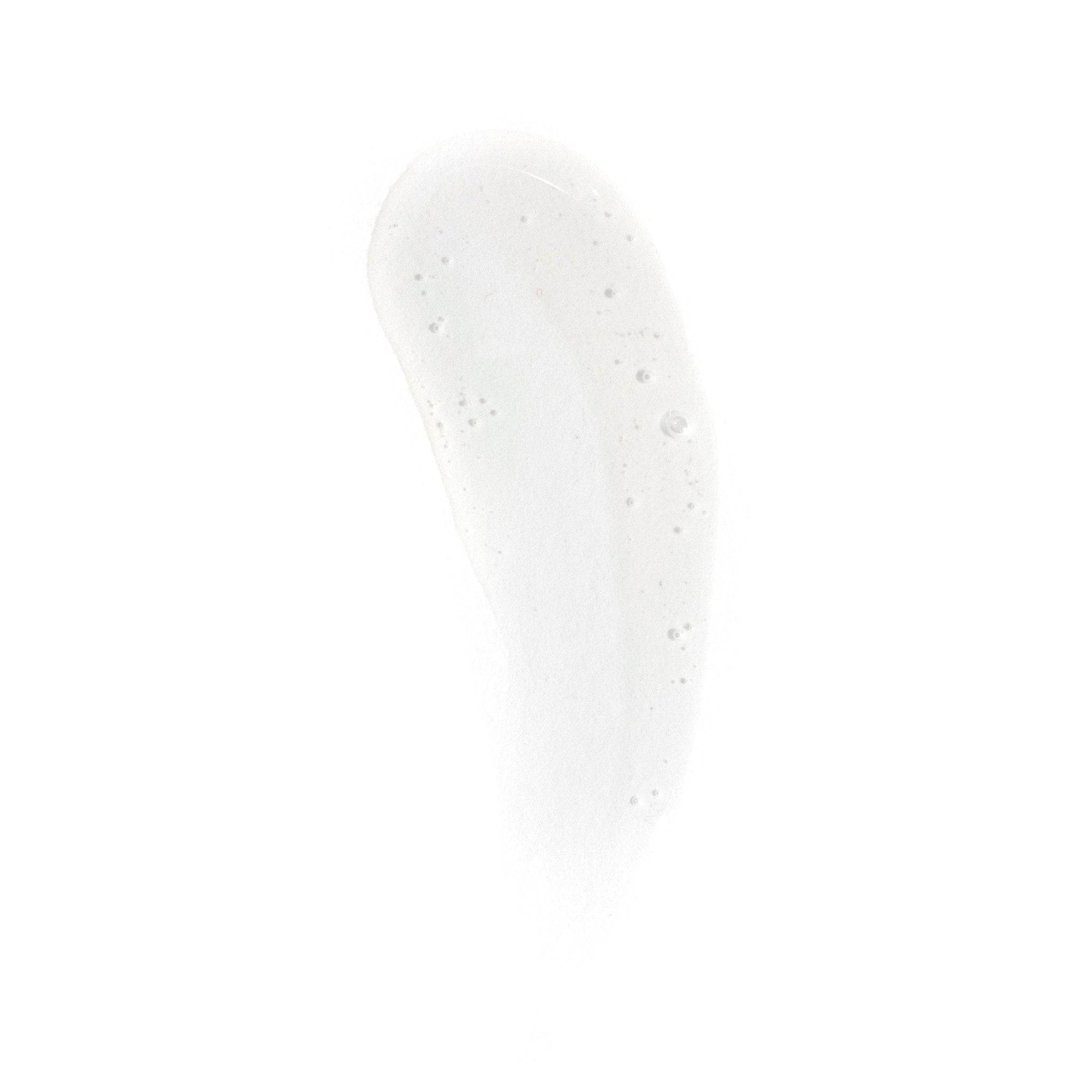 A translucent, slightly milky smear of Revision Skincare HA HydraSerum+™ gel with small bubbles, enriched with multi-molecular hyaluronic acid and peptides, shown on a white background.