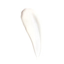 Revision Skincare Vitamin C Lotion 15% (1 fl oz), a smooth, creamy white lotion with antioxidants, is delicately smeared on a plain white background.