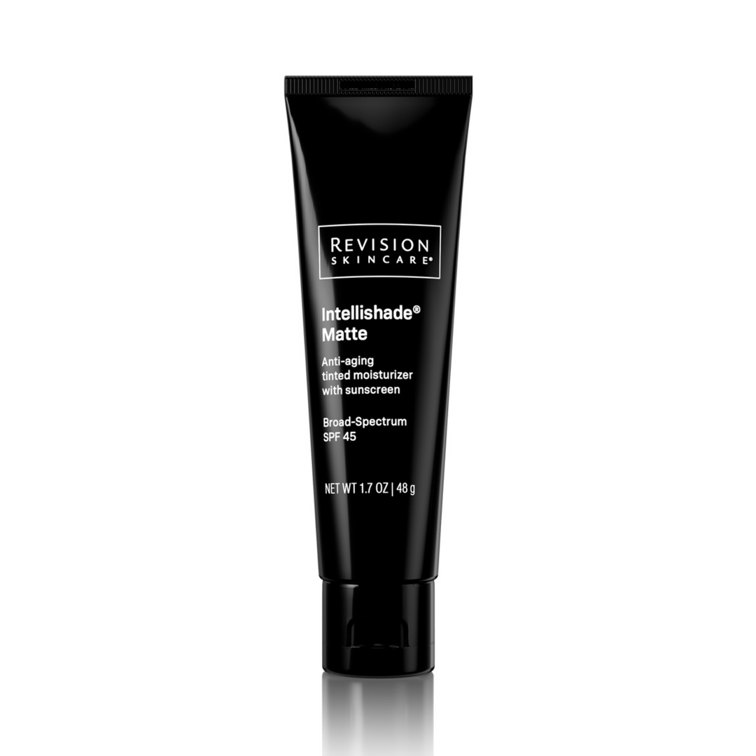 A black tube of Revision Skincare Intellishade® Matte, an anti-aging tinted moisturizer with a matte finish and broad-spectrum SPF 45, stands upright on a white background. Net wt. 1.7 oz (48g).