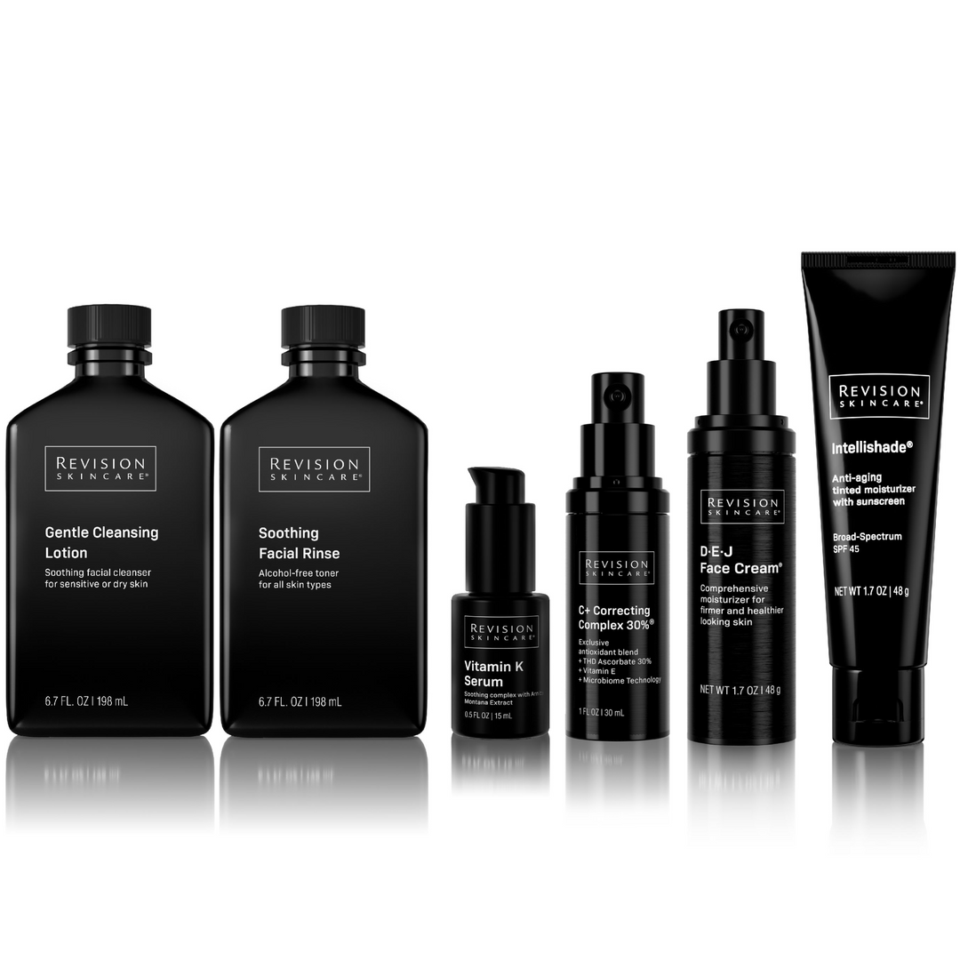 The Anti-Redness Complete Full-Size Regimen by Revision Skincare includes six products ideal for sensitive skin and rosacea, like Gentle Cleansing Lotion, Soothing Facial Rinse, Vitamin K Serum, C+ Correcting Complex 30%, DEJ Face Cream, and Intellishade.