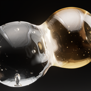 Two translucent bubbles, one clear and one golden, are fused together against a black background. Both bubbles contain small suspended droplets, creating a reflective, fluid-like appearance.