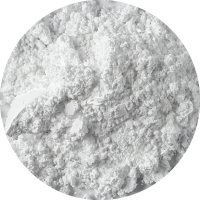 A close-up view of a fine, white powder with a slightly uneven, grainy texture, displayed against a plain background.