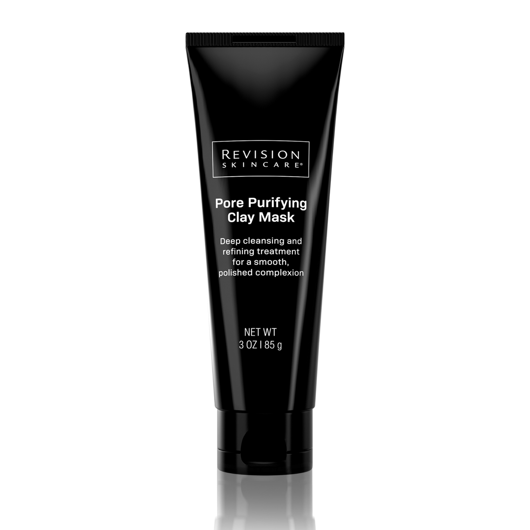 A tube of Revision Skincare Pore Purifying Clay Mask stands upright on a white background, its label clearly visible. Designed to unclog pores and deeply cleanse skin.