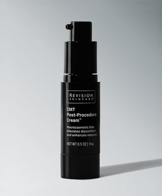 A black bottle of Revision Skincare CMT Post-Procedure Cream® with a pump dispenser stands upright on a gray surface, casting a shadow. The label notes benefits that support the epidermal barrier and promote recovery after procedures.