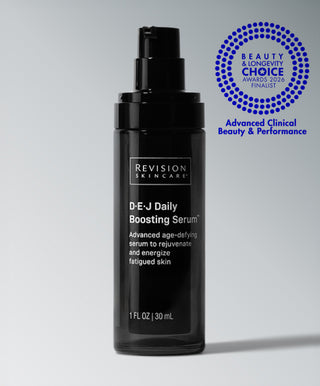 A black bottle of Revision Skincare D·E·J Daily Boosting Serum® stands upright on a light gray background, with a blue Beauty & Longevity Choice Awards 2026 Finalist badge visible at the top right.