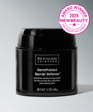 A black jar of Revision Skincare DermProtect Barrier Defense™ rests against a light background, with a pink 2025 NewBeauty Award Winner badge in the top right corner.