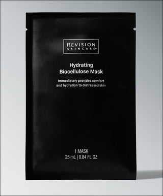 A single-use black packet of Revision Skincare Hydrating Biocellulose Mask (25 mL/0.84 fl oz) delivers soothing hydration and comfort to distressed or post-procedure skin.