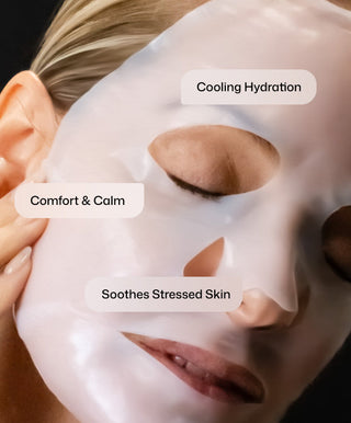 A close-up of a person with closed eyes wearing Revision Skincare’s Hydrating Biocellulose Mask, with labels reading Soothing Hydration, Comfort & Calm, and ideal for post-procedure skin.