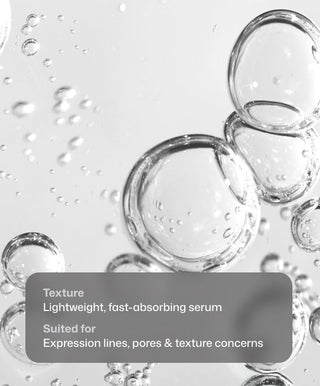 Close-up of clear serum bubbles on a light background. A gray text box overlays the image, highlighting Revision Skincare’s Revox™ Line Relaxer, a lightweight, fast-absorbing serum ideal for expression lines, pores, and texture concerns.