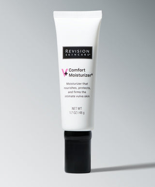 V+ Comfort Moisturizer® by Revision Skincare is a hormone-free moisturizer in a white tube with a black label, designed to effectively relieve vulvar dryness.